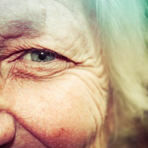 Close up of older lady's face focusing on her eye